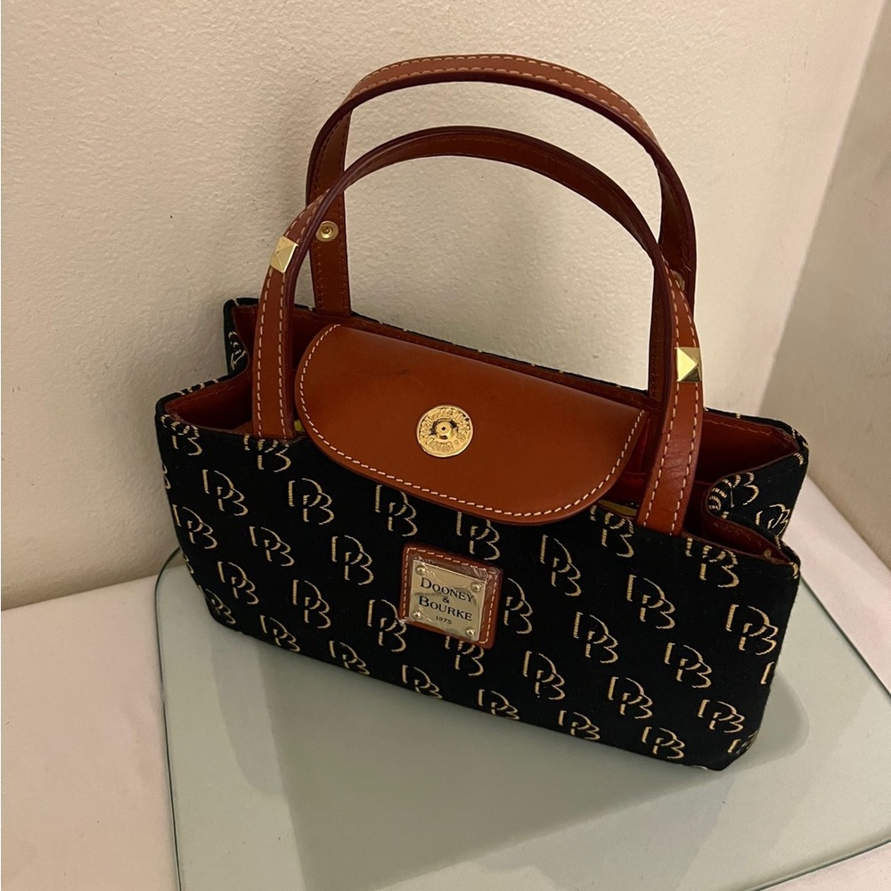 NWOT Dooney & Bourke Monogram BlK  Studded Canvas Brown Leather Flip-in Closure